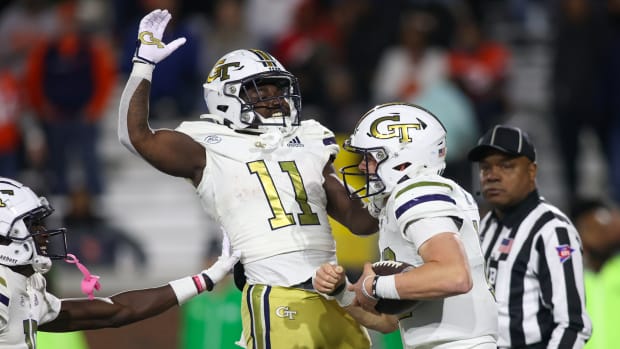 Nov 18, 2023; Atlanta, Georgia, USA; Georgia Tech Yellow Jackets quarterback Haynes King (10) celebrates after a touchdown with running back Jamal Haynes (11) against the Syracuse Orange in the second half at Bobby Dodd Stadium at Hyundai Field. (Brett Davis / USA TODAY Sports).